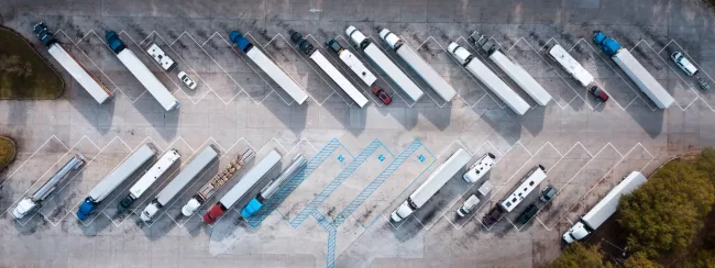 Aerial view of trucks parking looking quite abstract.
